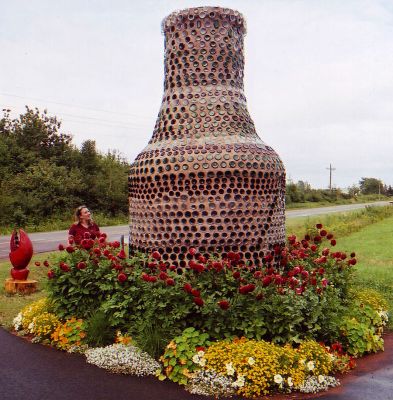 Bottle House Entrance
Some old guy retired and started making buildings from bottles.  There's a little shop which sells glass art and souvieniers and a beautiful garden out back with the houses.
