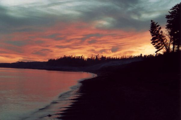 Sunset at Northumberland
Last night on the island.  See the smoke from the campfire drifting down the cliff?
